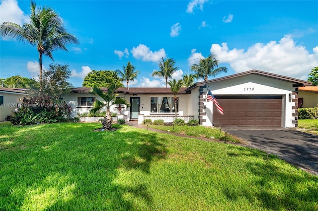 1770 NW 106th Ave, Pembroke Pines, FL 33026 - single story home featuring stucco siding, a garage, driveway, and a front yard