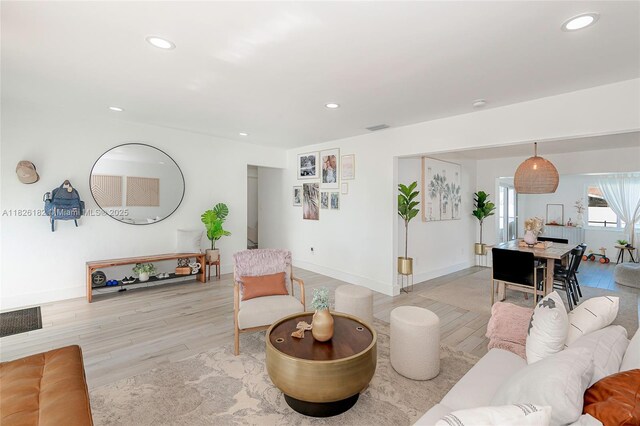 1770 NW 106th Ave, Pembroke Pines, FL 33026 - living area featuring light wood-style floors and recessed lighting