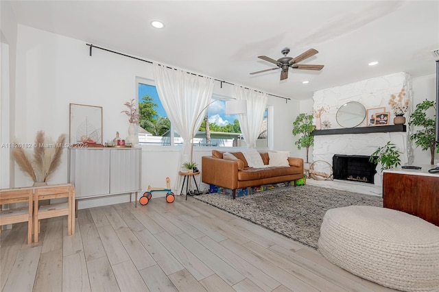 1770 NW 106th Ave, Pembroke Pines, FL 33026 - living room featuring ceiling fan, wood finished floors, a fireplace, and recessed lighting
