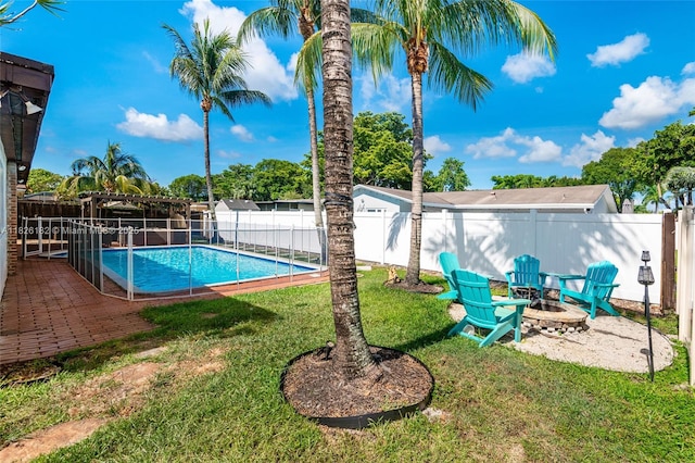 1770 NW 106th Ave, Pembroke Pines, FL 33026 - view of pool featuring a fire pit, a fenced backyard, and a patio