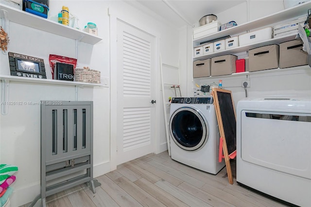 1770 NW 106th Ave, Pembroke Pines, FL 33026 - washroom featuring washing machine and dryer and light wood finished floors