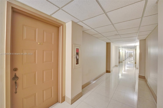 1201 S Ocean Dr Unit 218N, Hollywood, FL 33019 - corridor with a drop ceiling and light tile patterned floors