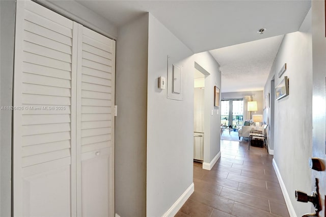 1201 S Ocean Dr Unit 218N, Hollywood, FL 33019 - corridor with baseboards