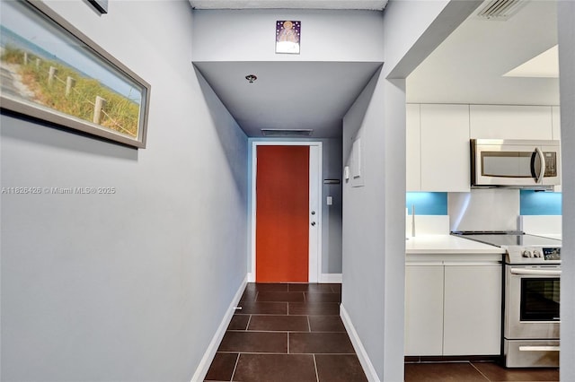 1201 S Ocean Dr Unit 218N, Hollywood, FL 33019 - entryway with dark tile patterned flooring