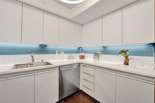 1201 S Ocean Dr Unit 218N, Hollywood, FL 33019 - laundry room featuring a sink and dark tile patterned flooring