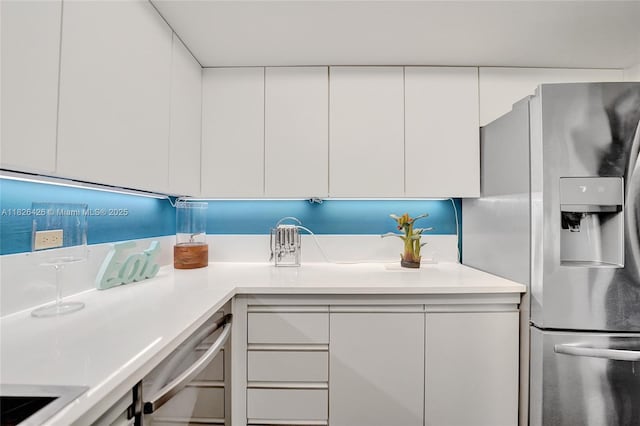 1201 S Ocean Dr Unit 218N, Hollywood, FL 33019 - kitchen featuring stainless steel appliances, white cabinets, light countertops, and modern cabinets
