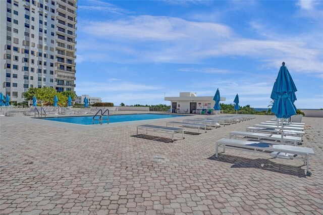 1201 S Ocean Dr Unit 218N, Hollywood, FL 33019 - community pool featuring a patio