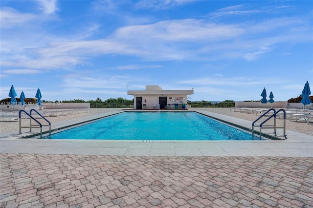 1201 S Ocean Dr Unit 218N, Hollywood, FL 33019 - community pool featuring a patio