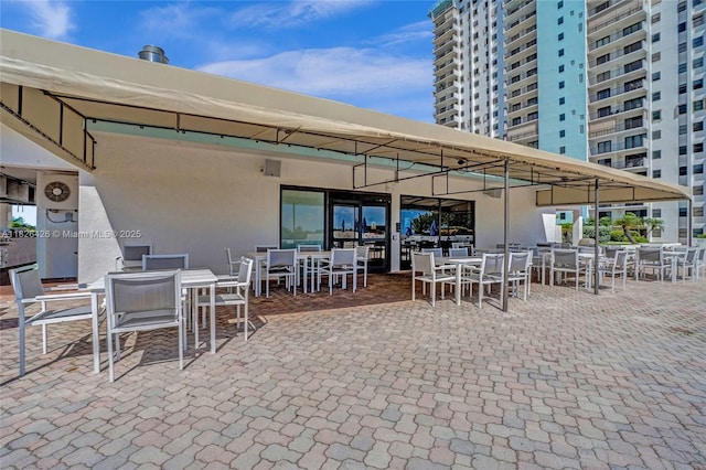 1201 S Ocean Dr Unit 218N, Hollywood, FL 33019 - view of patio / terrace featuring outdoor dining area