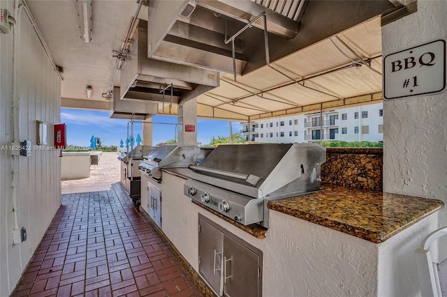 1201 S Ocean Dr Unit 218N, Hollywood, FL 33019 - view of patio / terrace with an outdoor kitchen