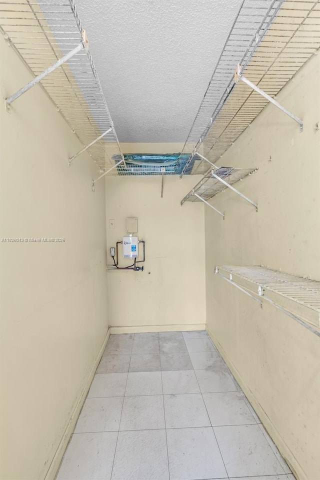 13255 SW 7th Ct Unit 113D, Pembroke Pines, FL 33027 - spacious closet with light tile patterned floors