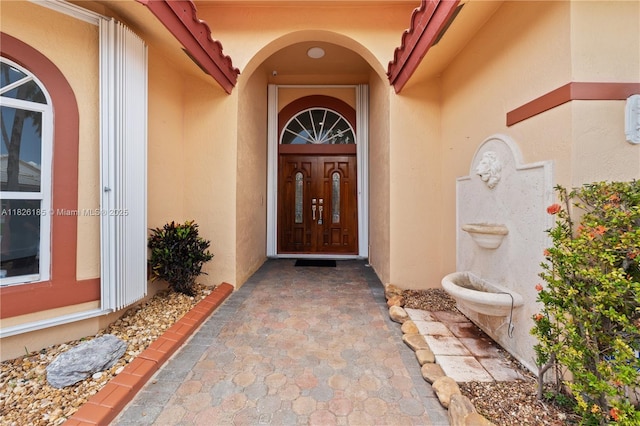11581 SW 10th Ct, Pembroke Pines, FL 33025 - doorway to property with stucco siding