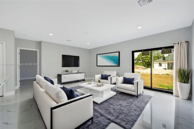626 Hobart Ave S, Lehigh Acres, FL 33974 - living area featuring marble finish flooring and recessed lighting