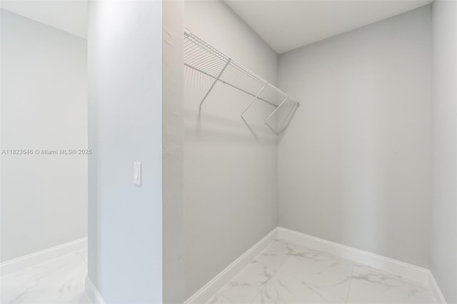 626 Hobart Ave S, Lehigh Acres, FL 33974 - spacious closet with light marble finish flooring