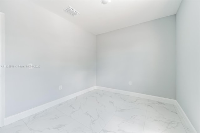 626 Hobart Ave S, Lehigh Acres, FL 33974 - empty room featuring marble finish flooring