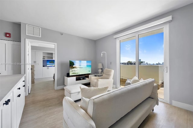1621 Bay Rd Unit Ph3, Miami Beach, FL 33139 - living room with light wood finished floors