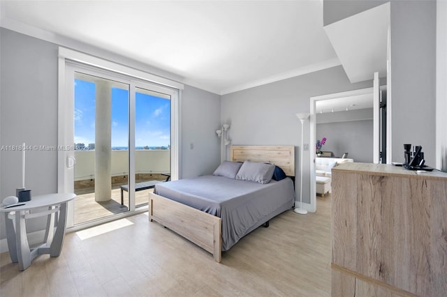 1621 Bay Rd Unit Ph3, Miami Beach, FL 33139 - bedroom featuring access to exterior and light wood finished floors
