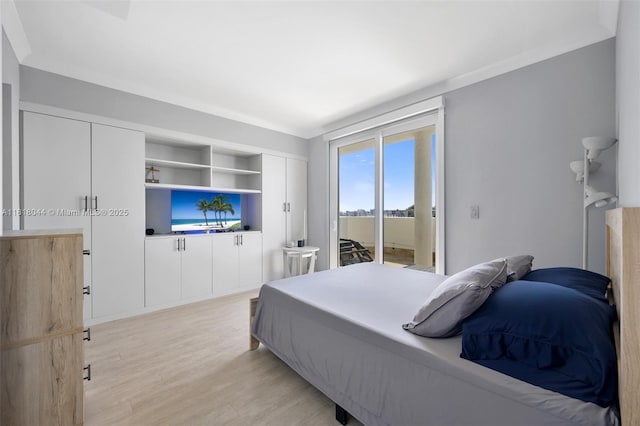 1621 Bay Rd Unit Ph3, Miami Beach, FL 33139 - bedroom with access to exterior and light wood-style flooring