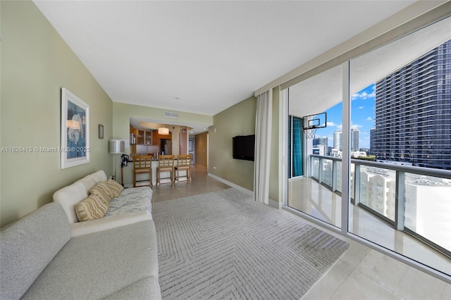 480 NE 30th St Unit 1402, Miami, FL 33137 - living room with tile patterned flooring and expansive windows