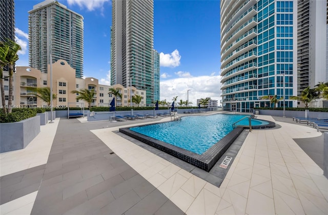 480 NE 30th St Unit 1402, Miami, FL 33137 - community pool featuring a patio area