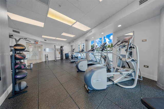 480 NE 30th St Unit 1402, Miami, FL 33137 - exercise room with a drop ceiling and baseboards