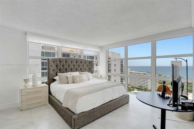 2701 N Ocean Blvd Unit 18A, Fort Lauderdale, FL 33308 - bedroom with multiple windows and a textured ceiling
