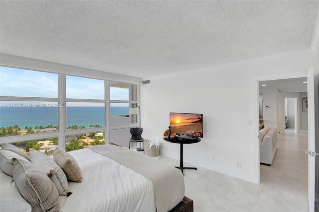 2701 N Ocean Blvd Unit 18A, Fort Lauderdale, FL 33308 - bedroom featuring a textured ceiling and baseboards