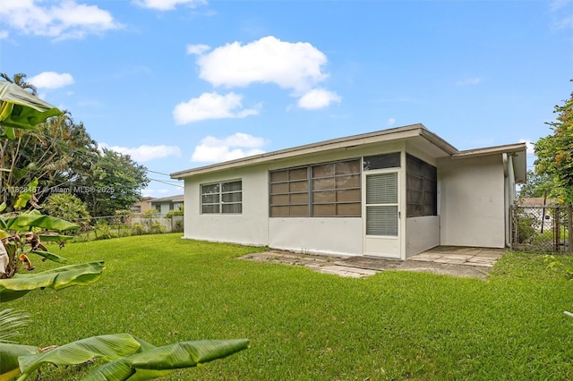 6441 NW 26th St, Sunrise, FL 33313 - rear view of property featuring stucco siding