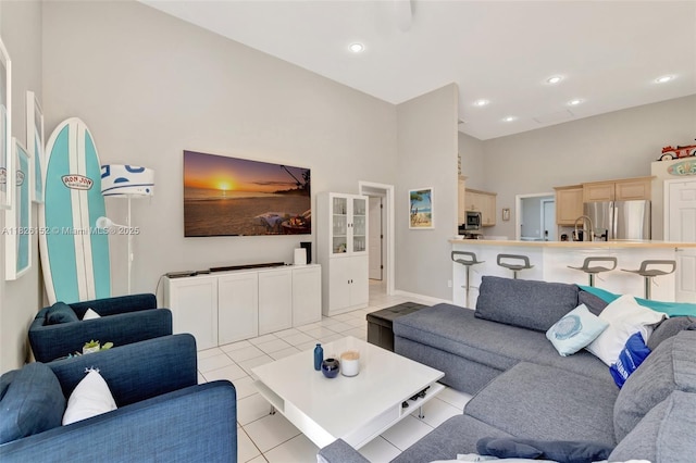 1137 SW Lighthouse Dr, Palm City, FL 34990 - living room with a towering ceiling, light tile patterned floors, and recessed lighting