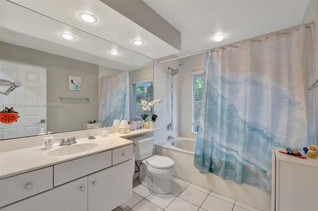 1137 SW Lighthouse Dr, Palm City, FL 34990 - full bath featuring shower / bath combo with shower curtain, tile patterned floors, vanity, and recessed lighting