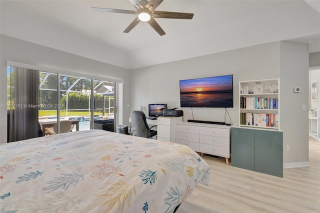 1137 SW Lighthouse Dr, Palm City, FL 34990 - bedroom featuring access to outside, light wood-type flooring, ceiling fan, and lofted ceiling