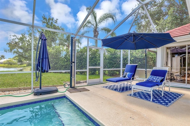 1137 SW Lighthouse Dr, Palm City, FL 34990 - outdoor pool with a lanai, a patio area, a lawn, and a water view