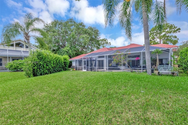 1137 SW Lighthouse Dr, Palm City, FL 34990 - view of grassy yard with glass enclosure