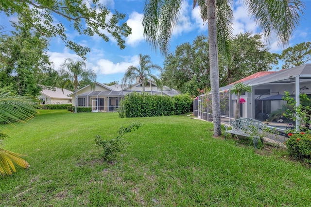 1137 SW Lighthouse Dr, Palm City, FL 34990 - view of green lawn featuring a lanai