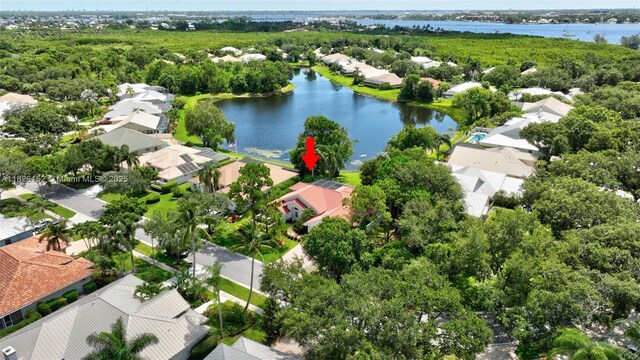 1137 SW Lighthouse Dr, Palm City, FL 34990 - aerial view of residential area featuring a nearby body of water