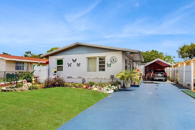 5637 SW 40th St, West Park, FL 33023 - view of front of property with a carport and concrete driveway