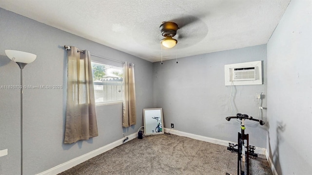 5637 SW 40th St, West Park, FL 33023 - laundry room with a ceiling fan, a wall mounted air conditioner, carpet flooring, and a textured ceiling