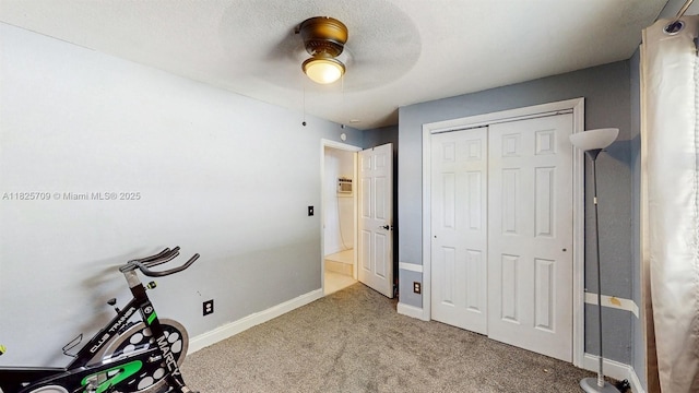 5637 SW 40th St, West Park, FL 33023 - exercise area with carpet flooring, a ceiling fan, and a wall unit AC