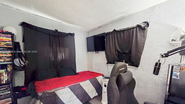 5637 SW 40th St, West Park, FL 33023 - bedroom with a textured ceiling and a textured wall