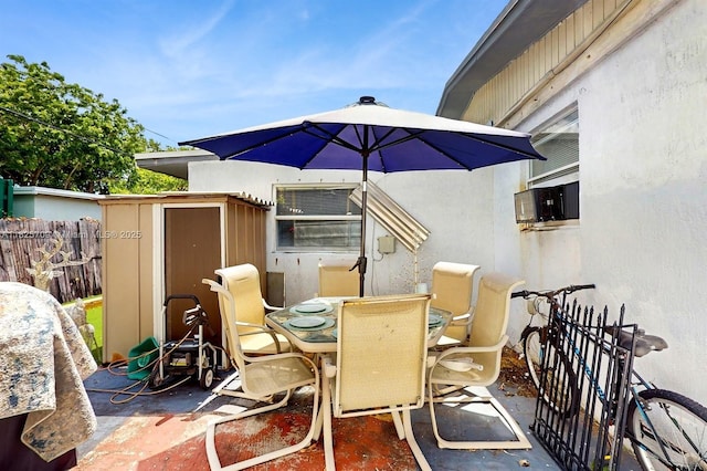 5637 SW 40th St, West Park, FL 33023 - view of patio featuring a storage unit and outdoor dining area