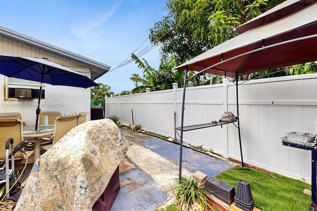 5637 SW 40th St, West Park, FL 33023 - view of patio / terrace featuring cooling unit and a gazebo