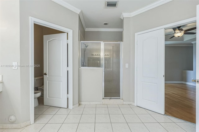 12986 SW 21st St, Miramar, FL 33027 - full bath with ornamental molding, a shower stall, a ceiling fan, and tile patterned floors