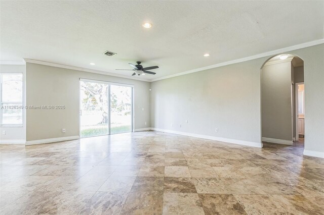 12986 SW 21st St, Miramar, FL 33027 - unfurnished room featuring arched walkways, ceiling fan, healthy amount of natural light, ornamental molding, and recessed lighting