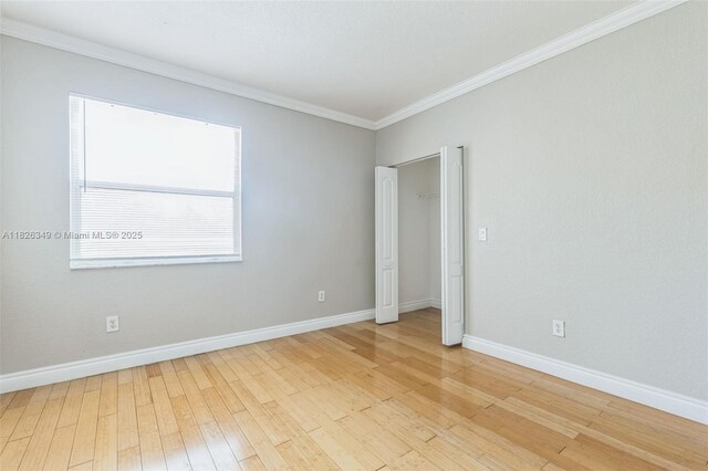12986 SW 21st St, Miramar, FL 33027 - unfurnished room with crown molding and light wood-style floors