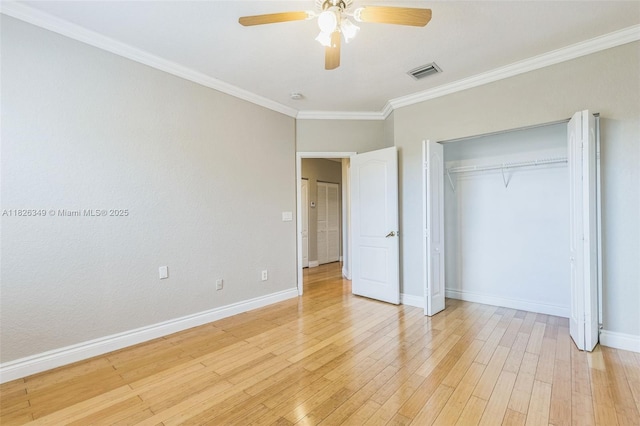 12986 SW 21st St, Miramar, FL 33027 - unfurnished bedroom featuring ornamental molding, light wood-style flooring, a closet, and ceiling fan