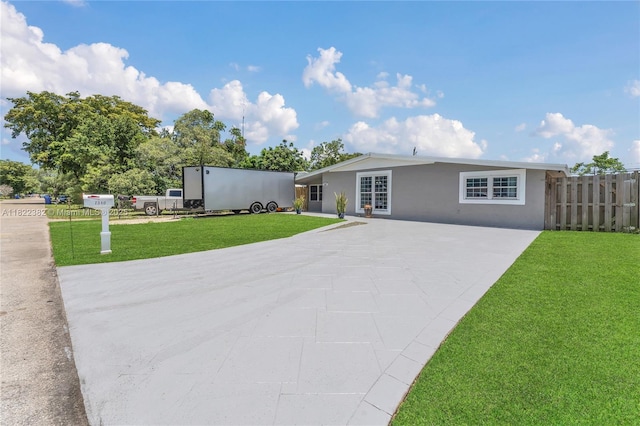 7540 Simms St, Hollywood, FL 33024 - view of front of house featuring stucco siding and driveway