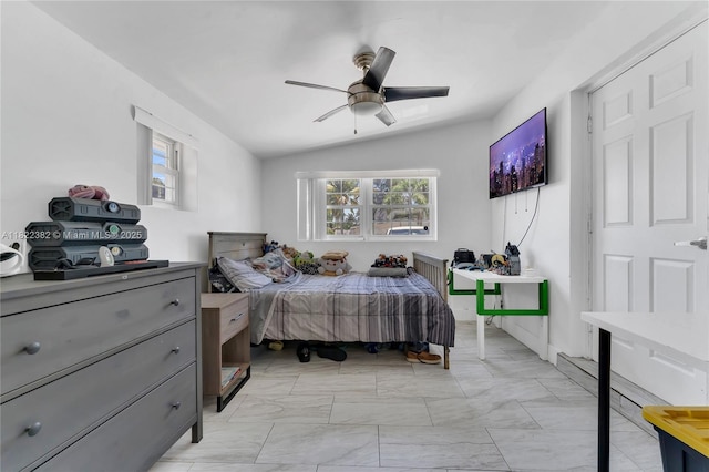 7540 Simms St, Hollywood, FL 33024 - bedroom with light marble finish flooring, vaulted ceiling, and a ceiling fan