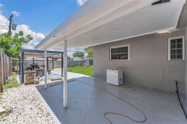 7540 Simms St, Hollywood, FL 33024 - fenced backyard with a patio area
