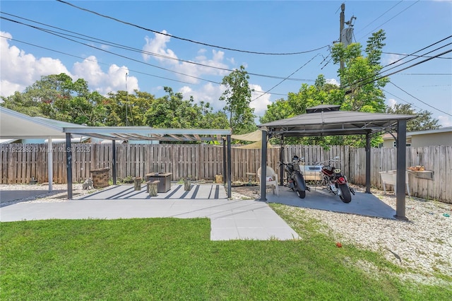 7540 Simms St, Hollywood, FL 33024 - fenced backyard with a gazebo and a patio area