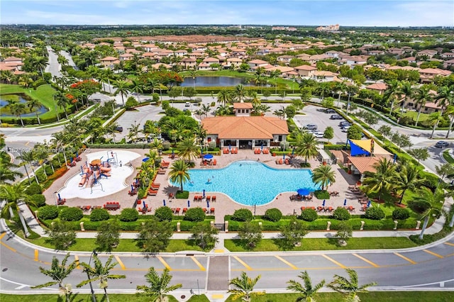 3457 NE 2nd St, Homestead, FL 33033 - aerial perspective of suburban area with a pool and a nearby body of water